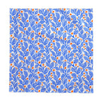 Mediterranean botanical dining table linen with a bold blue leaf pattern and terracotta accents for stylish everyday entertaining.
