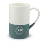 Close-up of the Speckled Wayland ceramic mug's speckled semi-gloss upper finish and natural matte-glazed base.