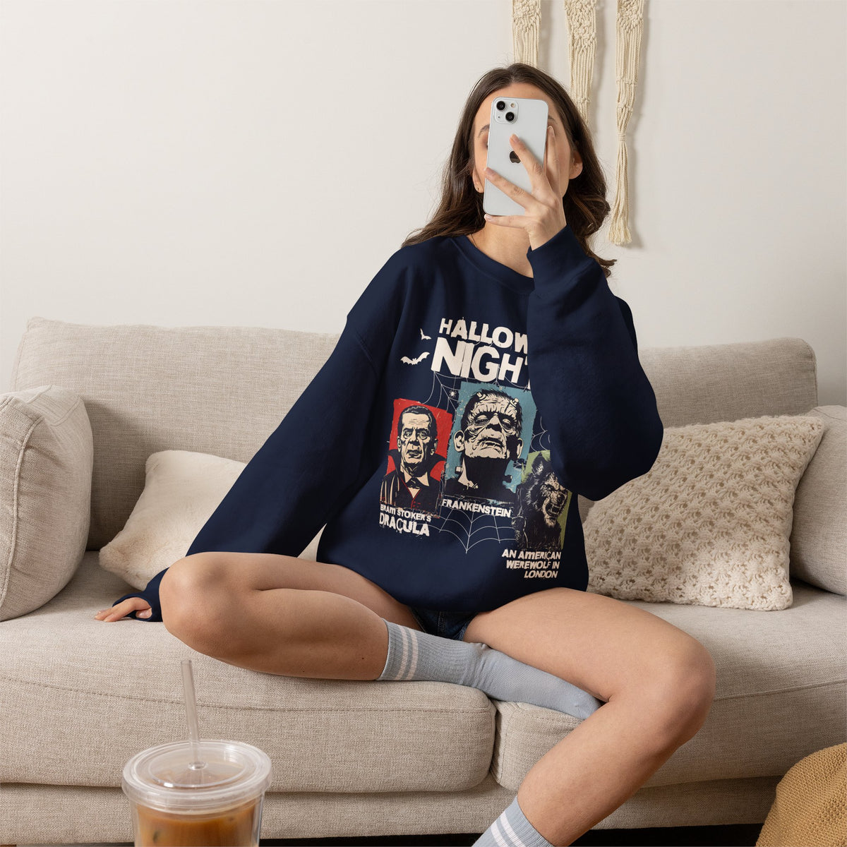 Horror Nights Halloween sweatshirt in Navy featuring retro horror-inspired character illustrations and bold Halloween Nights lettering.