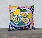 Lifestyle image featuring Oysters & Wine cushion placed on a sofa with a cozy, Mediterranean-inspired setting.