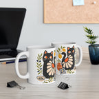 Black cat coffee mug shown from angled side highlighting double-sided printed artwork