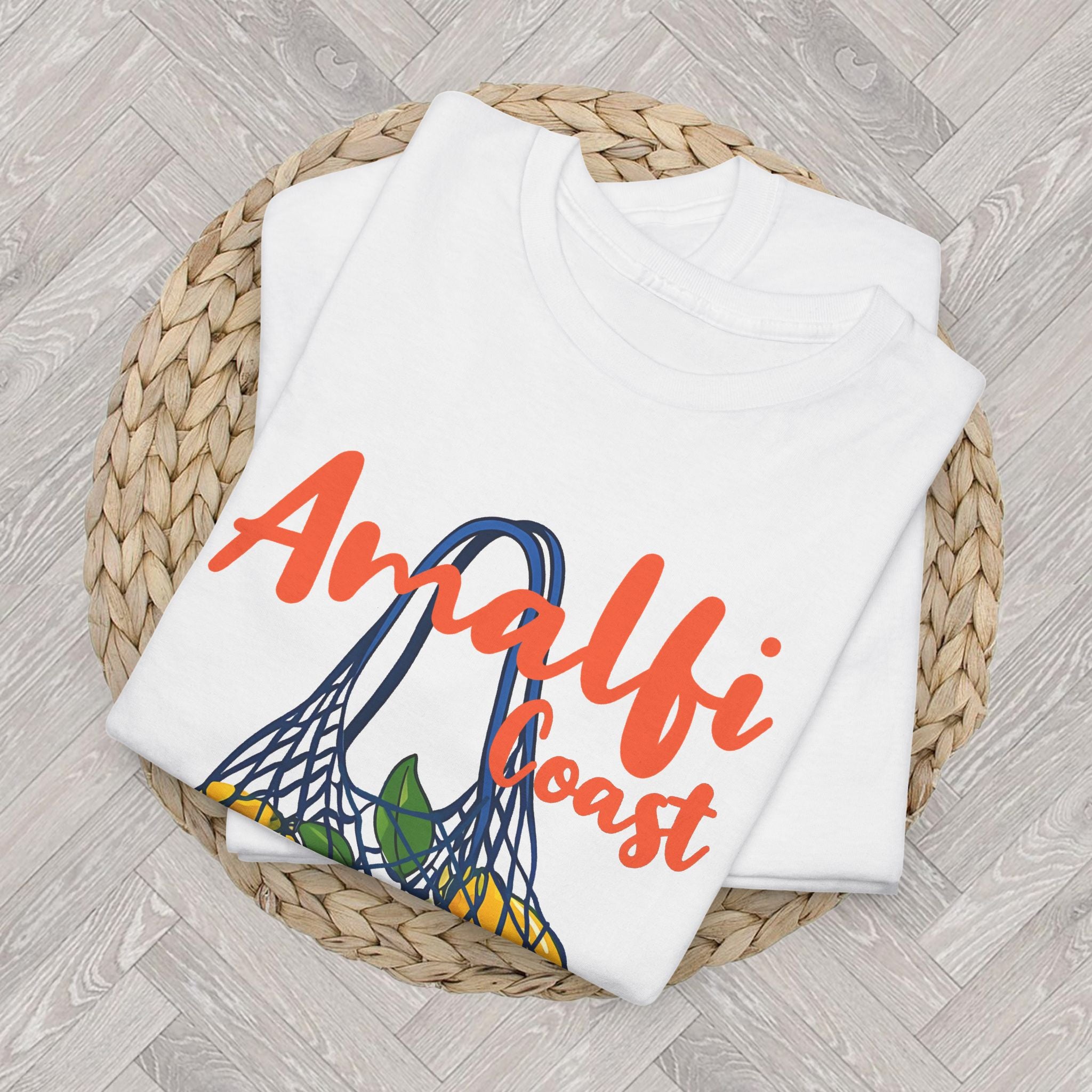 Close-up of Amalfi Coast Lemoncello t-shirt design with colorful lemons, green leaves, and vibrant orange typography