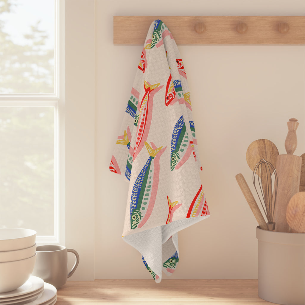 Quick-drying microfiber kitchen towel with a vibrant fish print, perfect for everyday cooking and coastal homes.