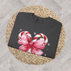 Cute Christmas candy cane sweatshirt ready for gifting during the holiday season