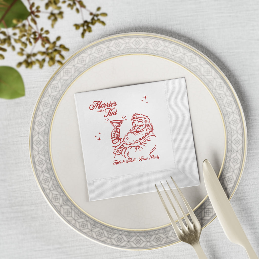 4.8 x 4.8 inch Merrier with a Tini beverage napkin featuring vintage Santa artwork for Christmas cocktails, martinis and mocktails.