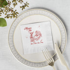 4.8 x 4.8 inch Merrier with a Tini beverage napkin featuring vintage Santa artwork for Christmas cocktails, martinis and mocktails.