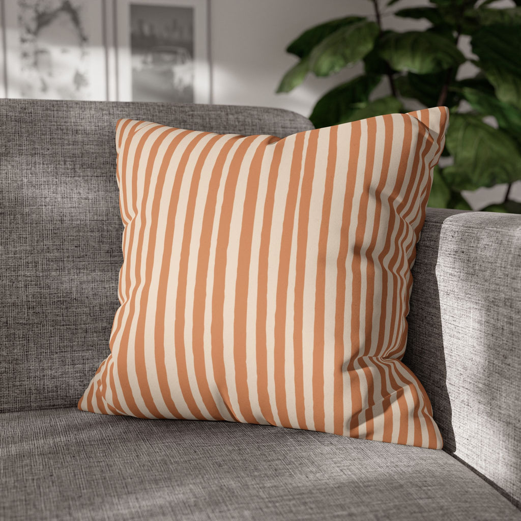 Concealed zipper detail on a terracotta faux suede square pillowcase with double-sided Halloween-inspired artwork.