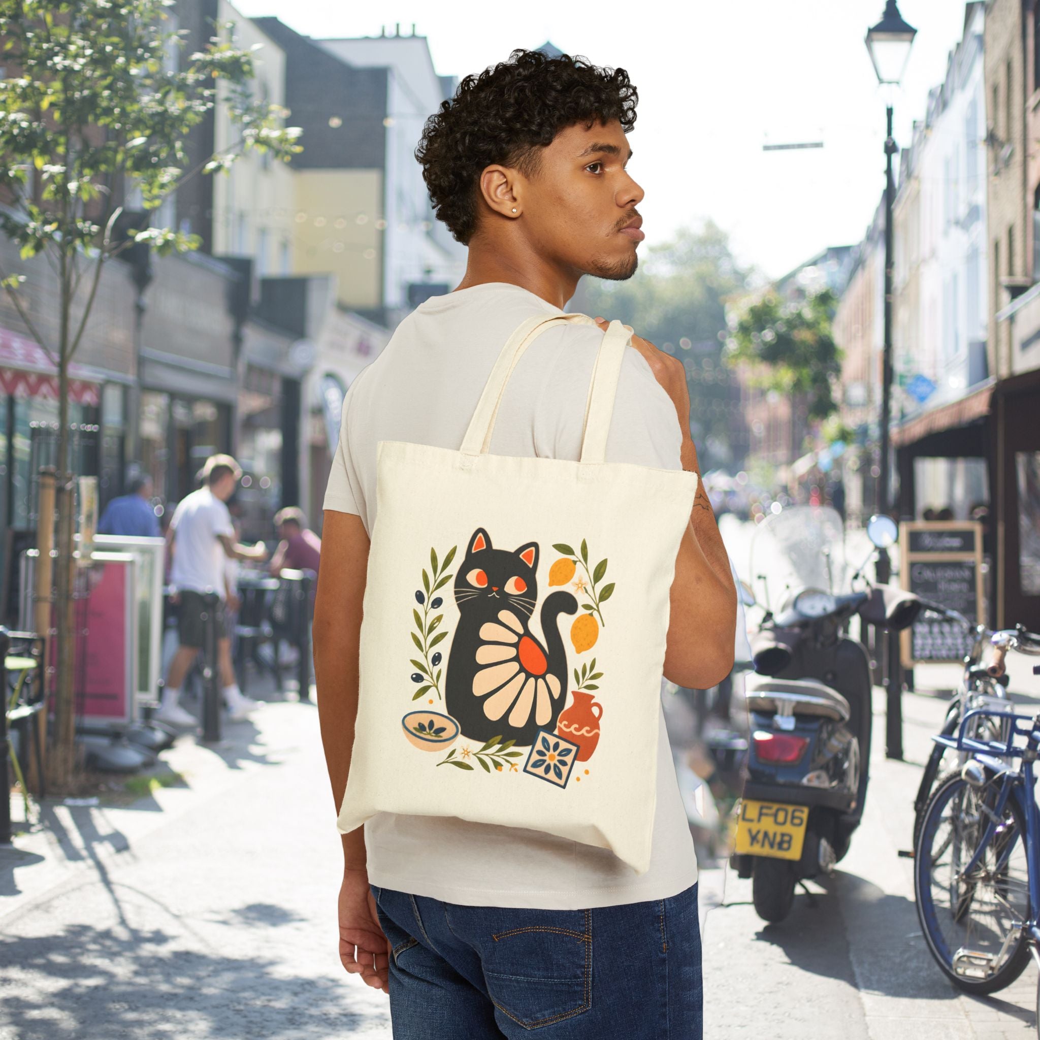 Black Matisse-inspired cat canvas tote with Mediterranean citrus, olive leaves, and coastal folk art design.