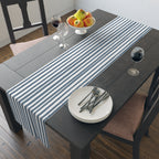 Slate blue striped table runner displayed on a long dining table for modern farmhouse styling