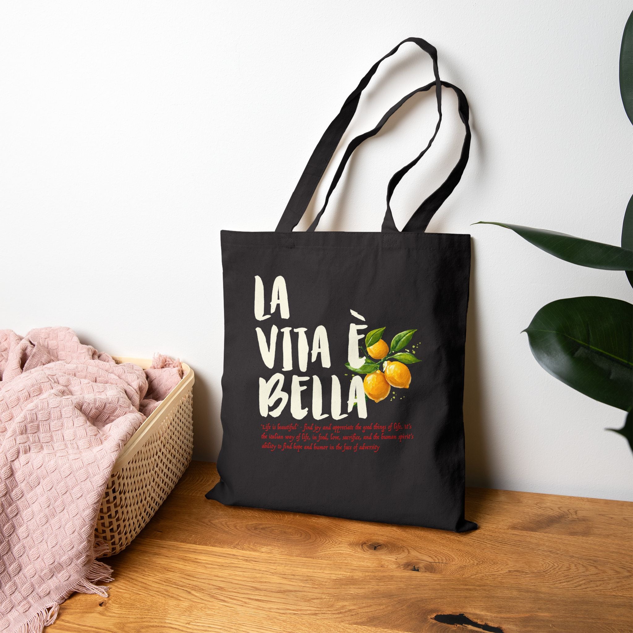Double-sided cotton canvas tote featuring bright yellow lemons and the Italian phrase La Vita è Bella meaning Life is Beautiful.