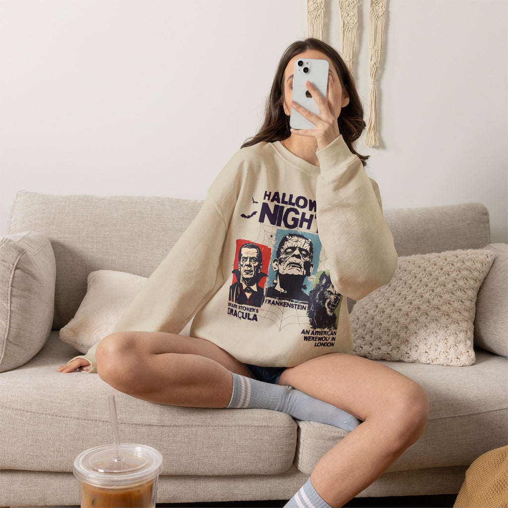 Close-up of the Horror Nights Halloween sweatshirt print highlighting the illustrated horror portraits and retro-style graphic design.