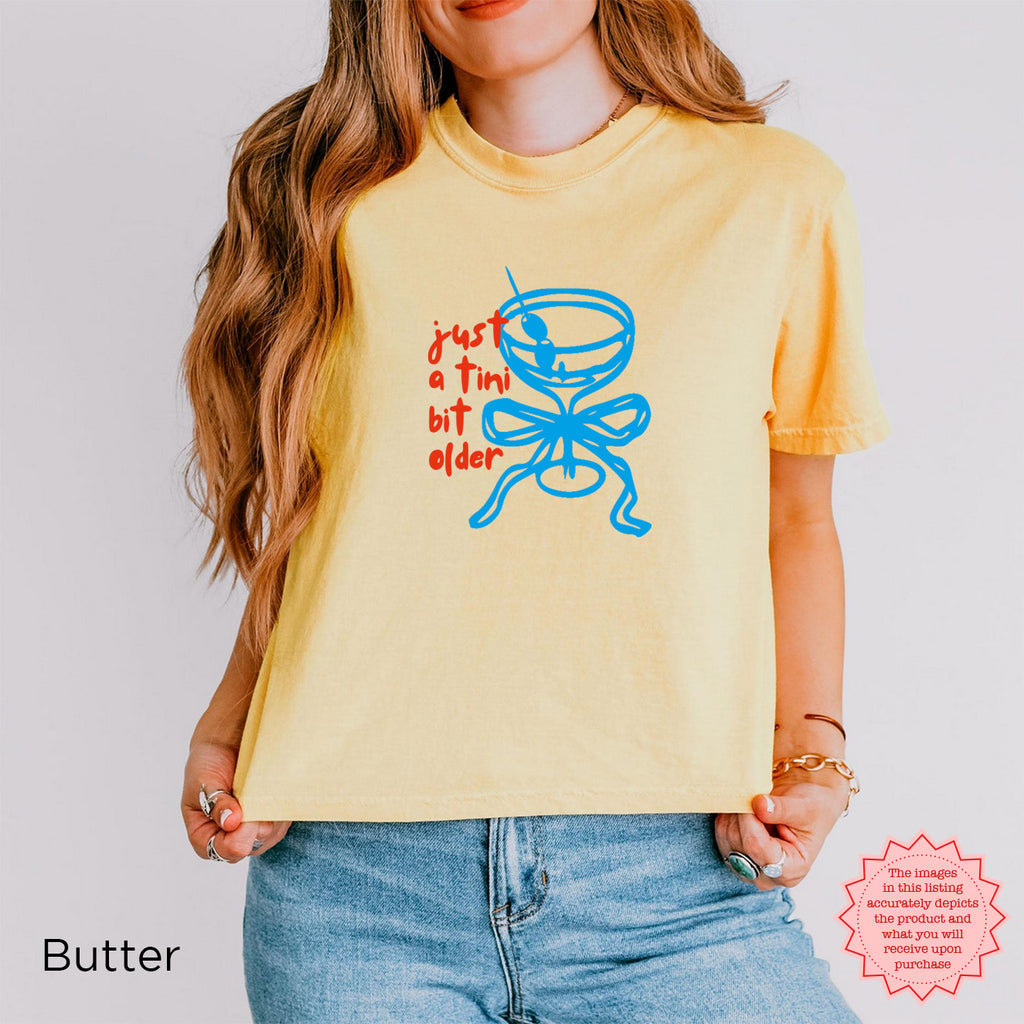 Yellow 'Just A Tini Bit Older' crop top featuring a fun martini graphic, perfect for a 30th birthday party.