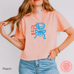 Peach crop top with 'Just A Tini Bit Older' graphic, a fun and quirky gift for any 30th birthday party.