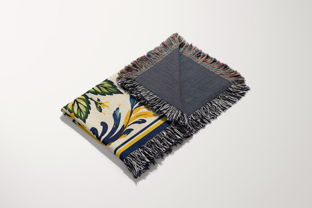 Close-up view of woven cotton texture and colorful fringed edges on a Mediterranean lemon blanket