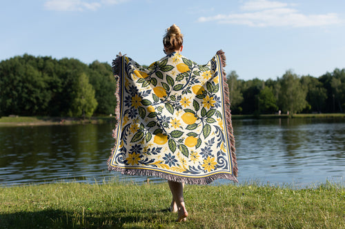 100% cotton Amalfi lemon throw blanket with woven threads and Italian coastal inspired botanical design