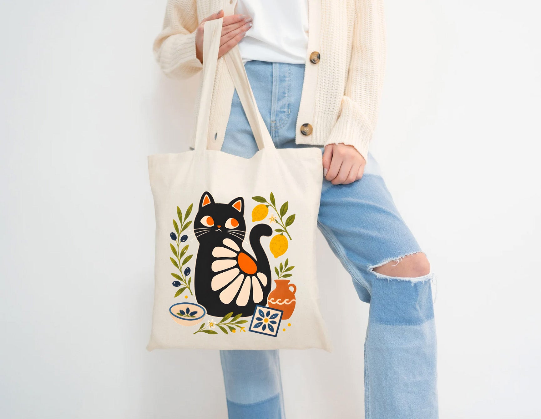 Reusable cotton canvas shopping bag showcasing a Mediterranean Matisse-style black cat illustration.