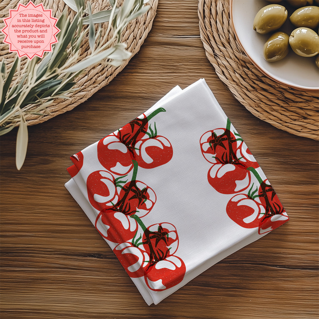 Close-up view of tomato printed cotton napkin showing detailed block print design and soft twill fabric texture