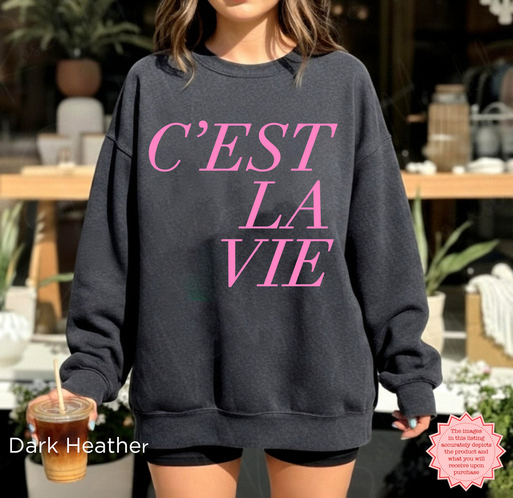 Dark heather C’EST LA VIE sweatshirt, Paris aesthetic casual travel look, cozy crewneck style