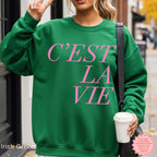 Irish green C’EST LA VIE sweatshirt, French-inspired fashion, cozy fall streetwear outfit for women