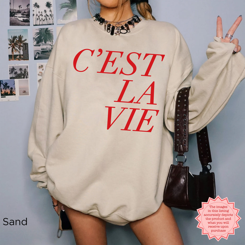 Sand color C’EST LA VIE sweatshirt, casual Paris-inspired streetwear, cozy oversized crewneck look