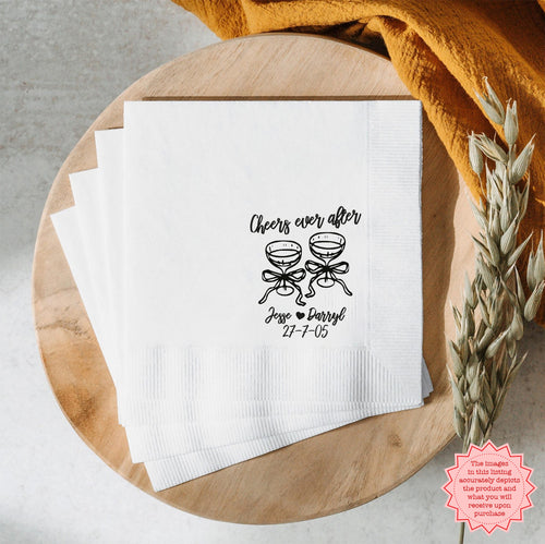 Personalized Cheers to Ever After wedding napkin featuring custom names and wedding date with elegant cocktail glass illustrations.