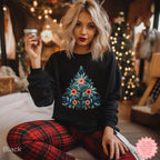 Black Christmas crewneck featuring a Mediterranean-inspired folk-art Christmas tree design.