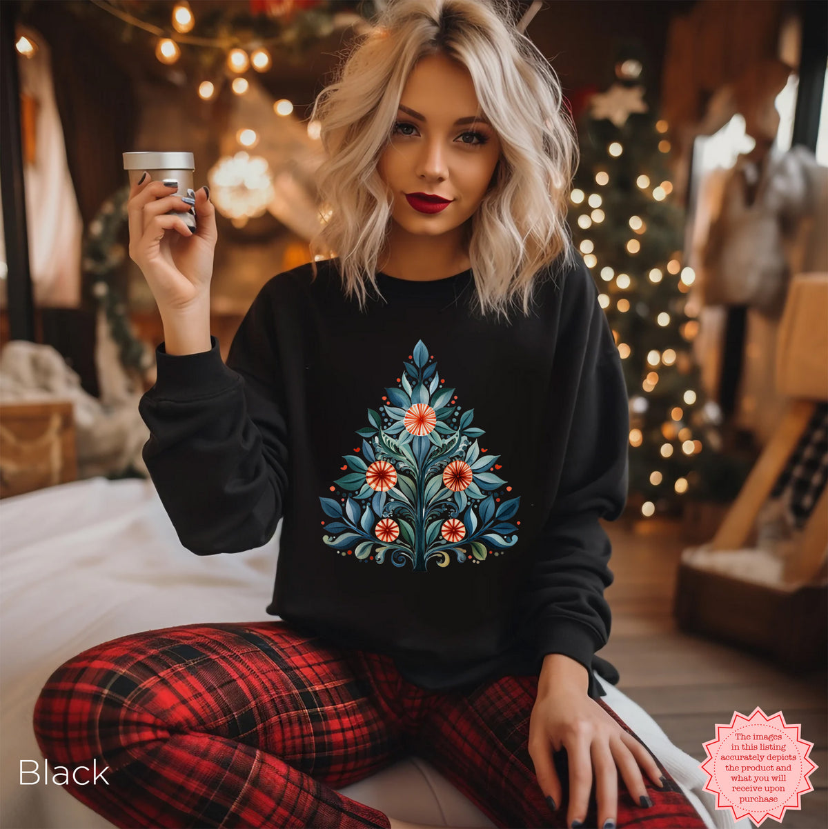 Black Christmas crewneck featuring a Mediterranean-inspired folk-art Christmas tree design.