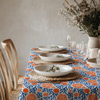 Blue coral botanical tablecloth inspired by Mediterranean sea life and coastal European interiors.