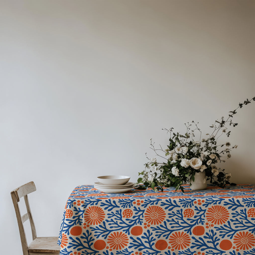 Mediterranean Coral Reef Tablecloth adding colour and coastal charm to a modern dining room.