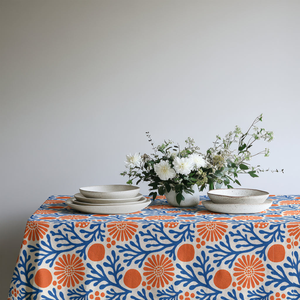 100% cotton twill Mediterranean tablecloth featuring a blue coral reef and terracotta floral print.