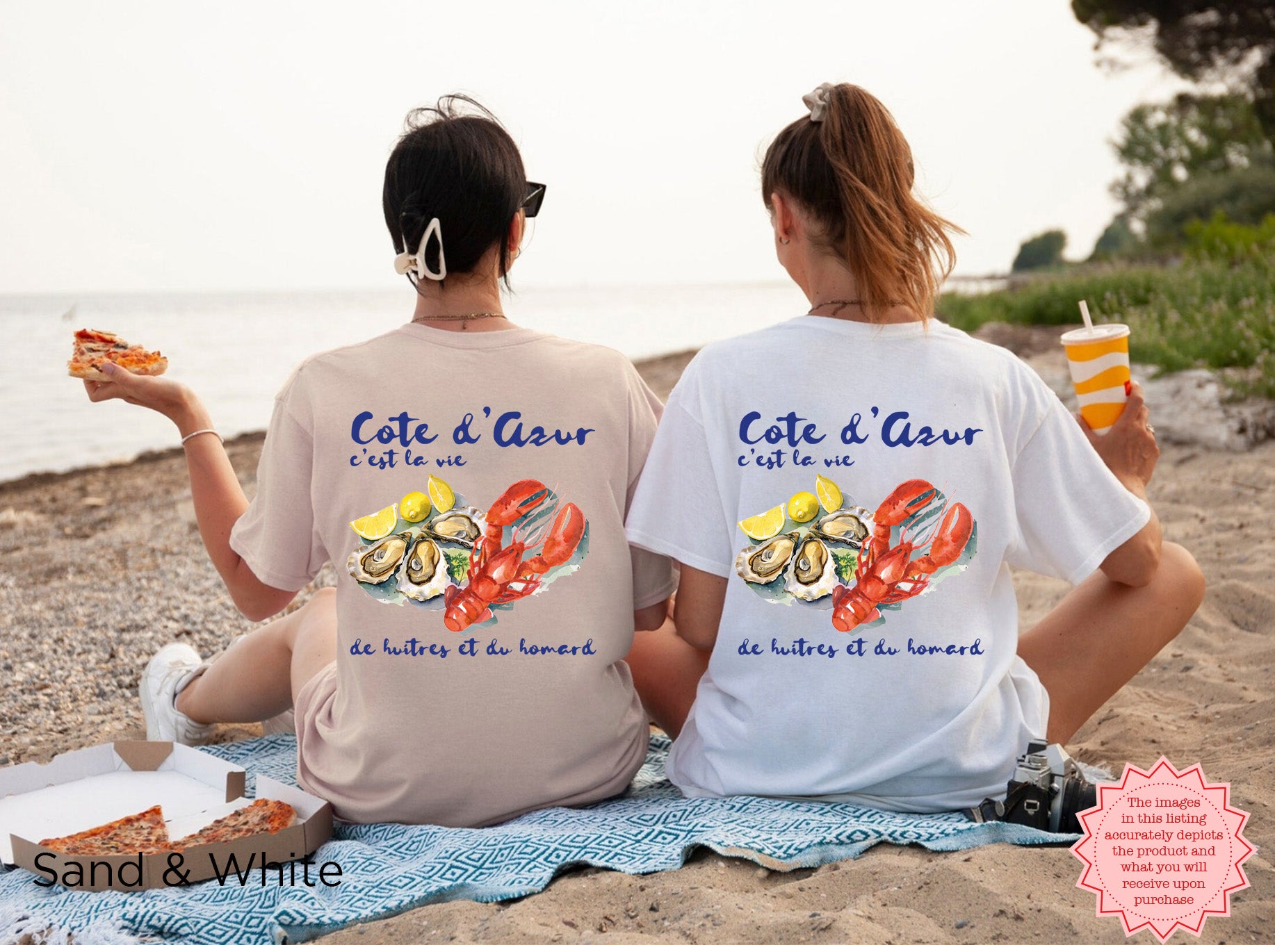 Sand, White-colored Cote d’Azur lobster and oysters watercolor t-shirt, casual coastal style, worn by a person descending wooden stairs to the beach, perfect for lobster roll enthusiasts and summer outfits.