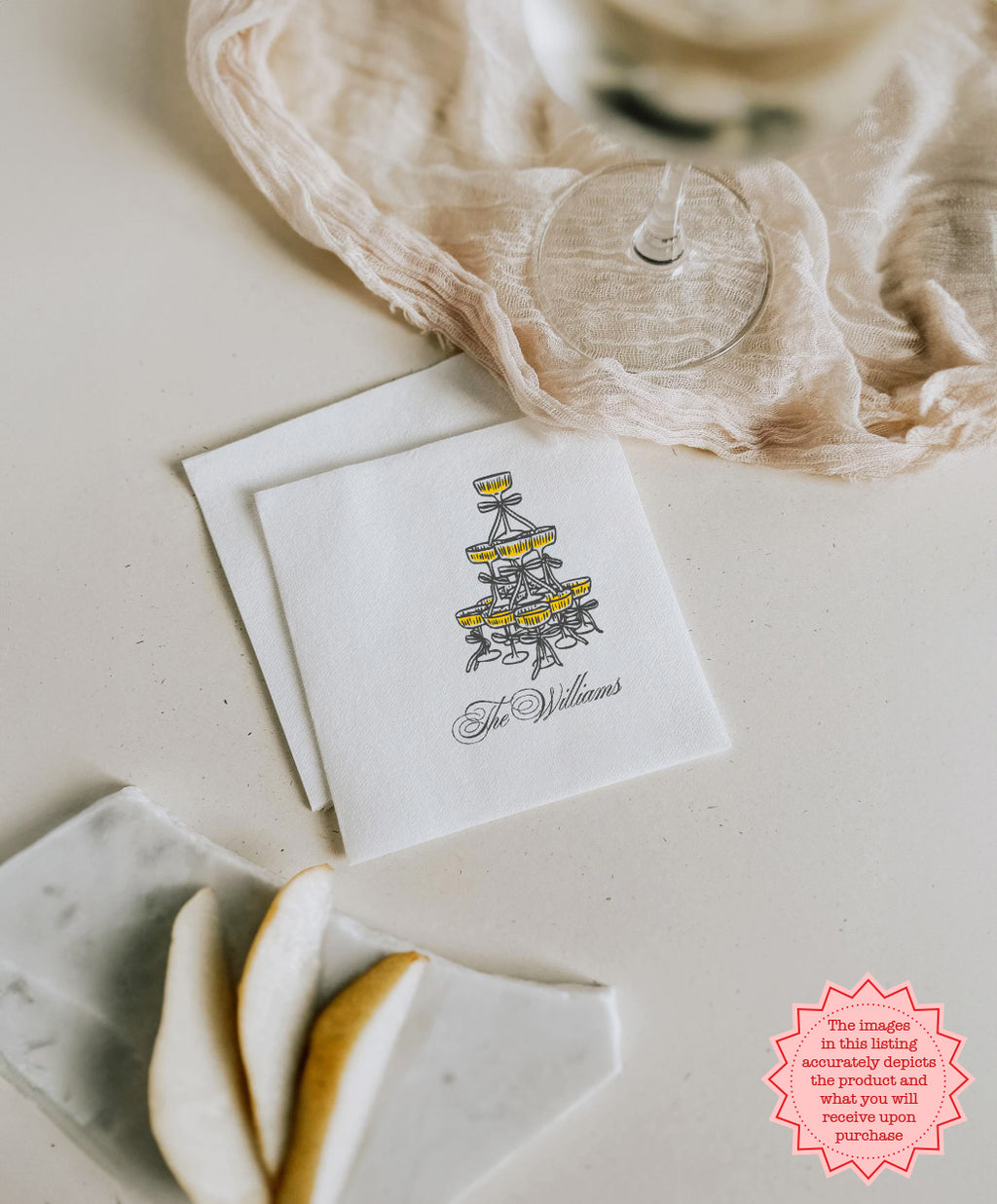 Custom Champagne Social Club cocktail napkin displayed for a champagne bar, personalized with names and celebration date.