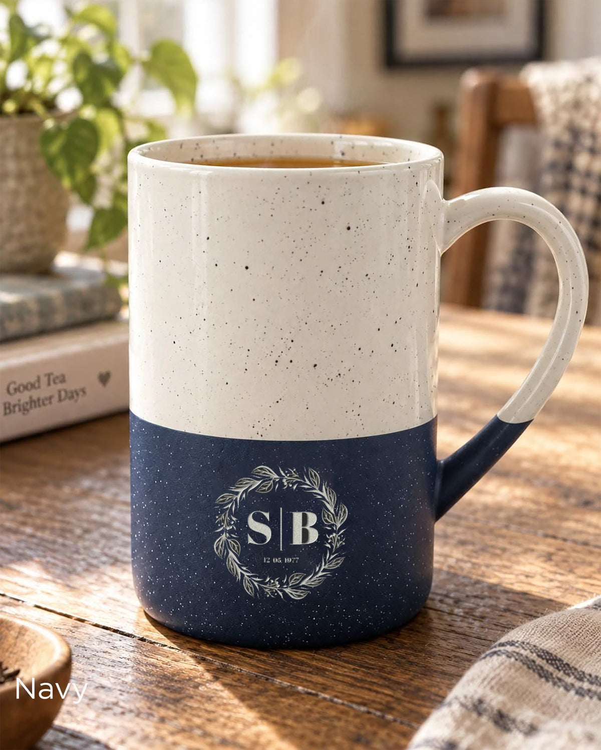 Navy blue Speckled Wayland ceramic mug featuring an olive branch crest and personalised name or initials with a special date.