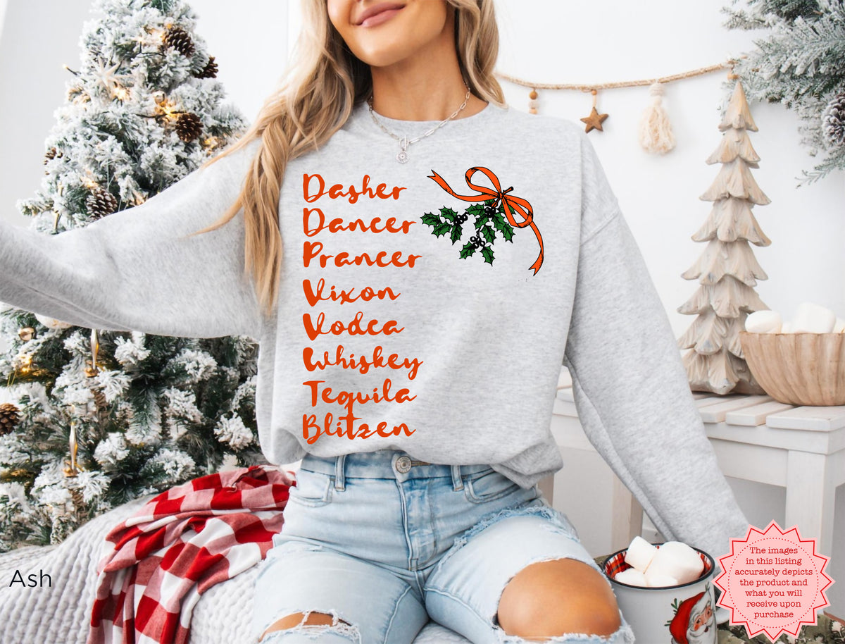 Funny reindeer and cocktail Christmas sweatshirt for women, a playful festive gift idea for best friends, sisters and cocktail lovers.