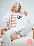 White funny Christmas sweatshirt for women featuring Dasher, Dancer, Prancer, Vixon, Vodka, Whiskey, Tequila and Blitzen in orange lettering with festive holly and a bow.