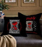 Gothic Halloween pillow cover featuring a bold red hourglass framed by decorative ivory patterns.