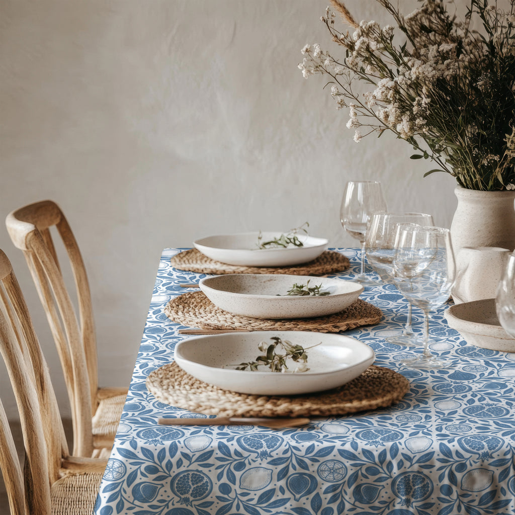 Dusty blue and white Mediterranean botanical tablecloth with pomegranate and fig motifs
