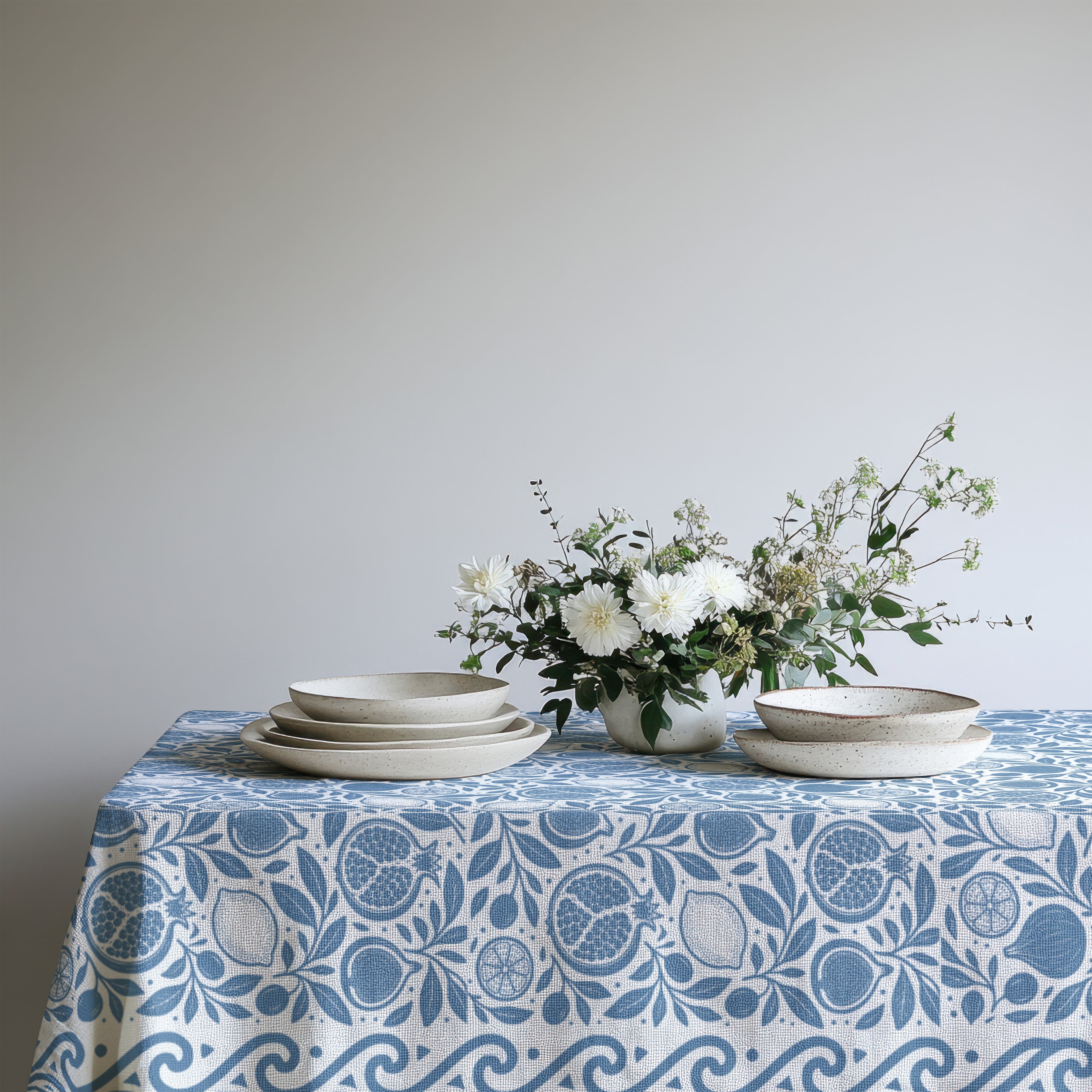 Mediterranean-inspired dusty blue and white fruit tablecloth for dining