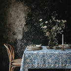 Blue botanical cotton tablecloth featuring pomegranates, figs, lemons and leafy branches