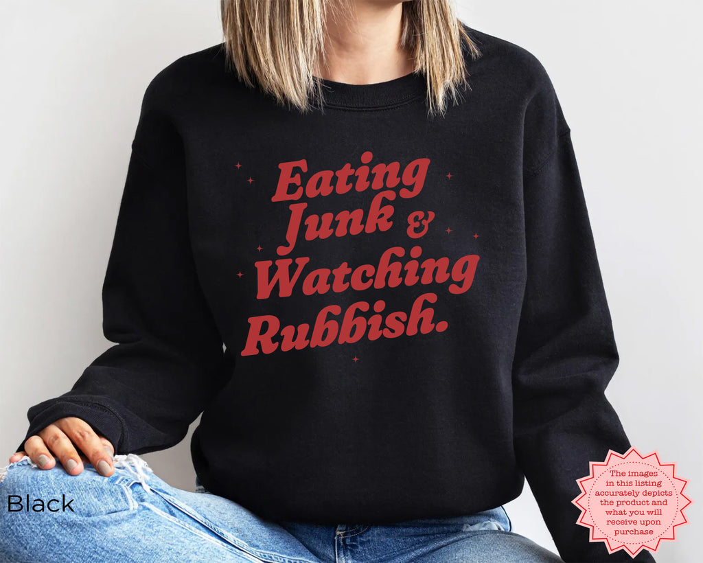 Retro-inspired holiday sweatshirt with funny Christmas movie night wording, shown in a cosy festive setting.
