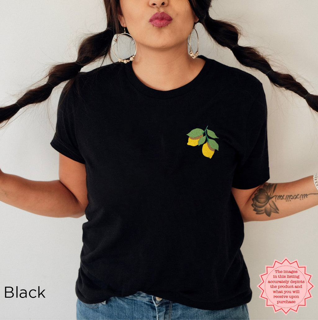 Minimalist embroidered lemon tee with citrus botanical design on the left chest