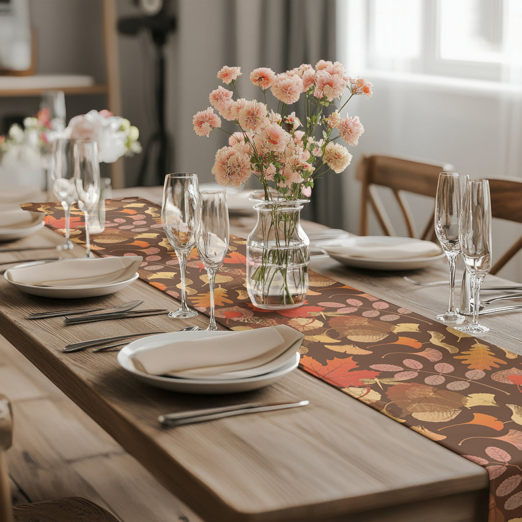 Autumn leaf table runner adding natural color and texture to a farmhouse dining table
