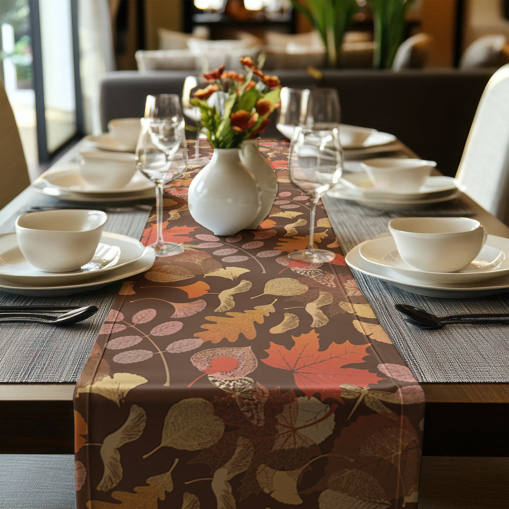 Fall leaf print table runner creating a warm and inviting autumn tablescape
