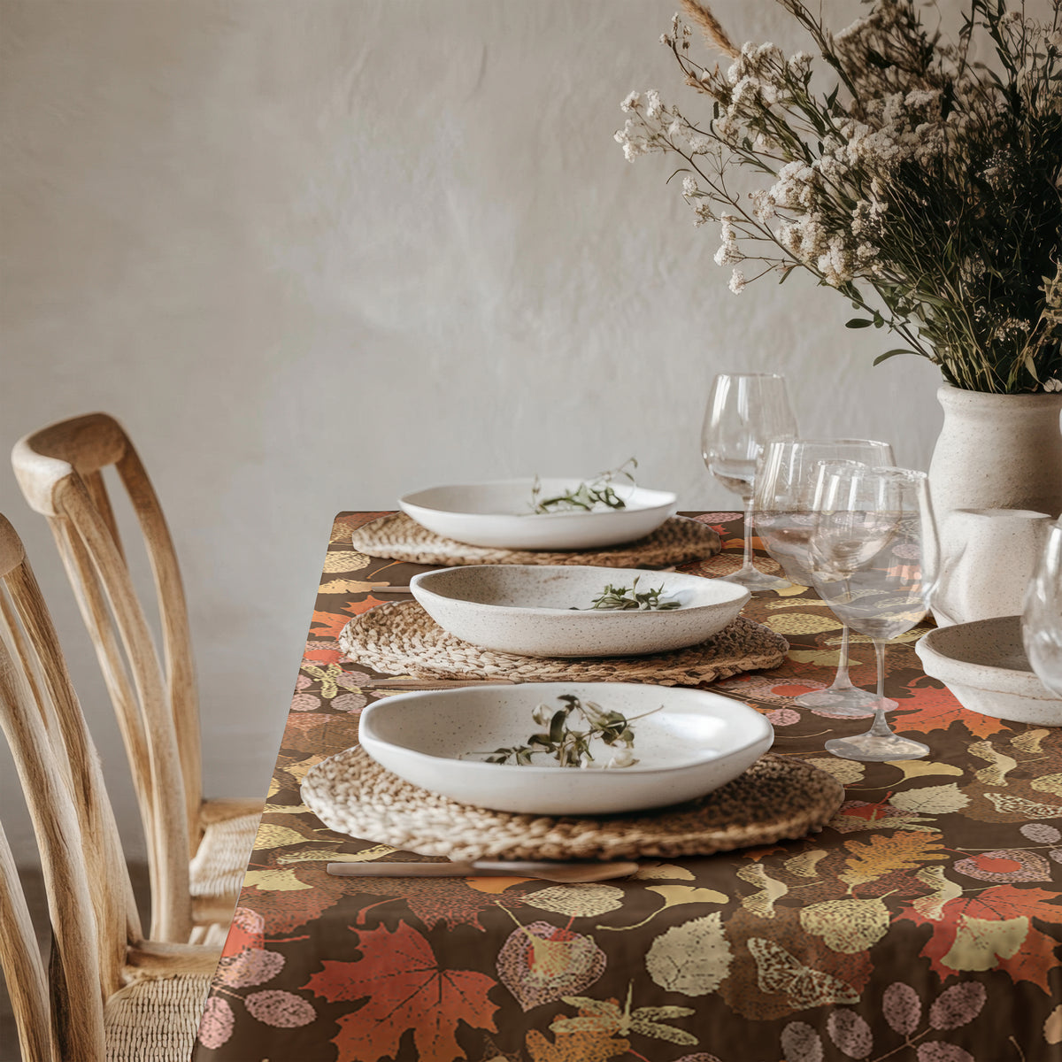 Autumn botanical tablecloth adding seasonal warmth to a farmhouse dining room decor setting