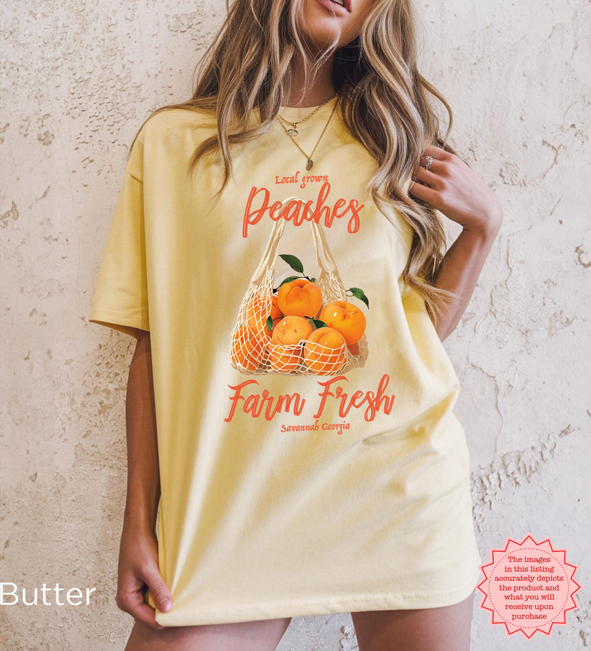 Lifestyle view of the Farm Fresh Peaches T-shirt styled casually with denim, showcasing the vintage-inspired peach and farmers’ market graphic.