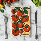 Close-up of vibrant tomato illustration on a durable cotton twill tea towel, perfect for drying dishes.