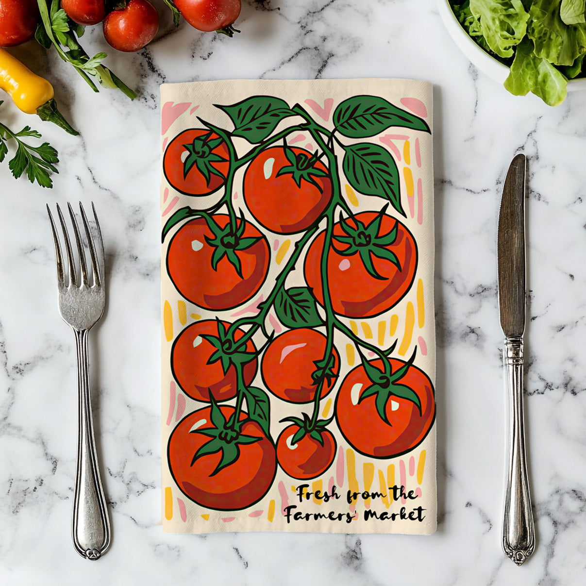Close-up of vibrant tomato illustration on a durable cotton twill tea towel, perfect for drying dishes.