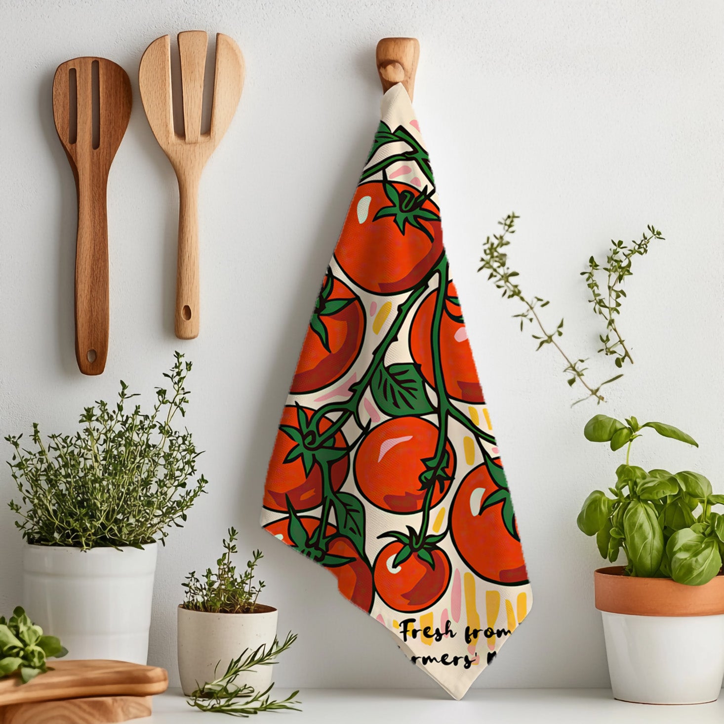 Mediterranean-inspired kitchen decor showing “Fresh from the Farmers’ Market” tea towel with tomato artwork.