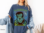 Denim: Blue Jean-colored Frankenstein gothic tee with vintage-inspired monster illustration and classic horror design