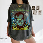 Pepper: Frankenstein graphic t-shirt in Pepper featuring Mary Shelley, gothic horror artwork, bats and lightning